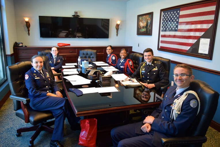 2019 cadets sitting around conference table