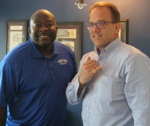 Attorney Chris Janes with Mr. Christopher Bell, Director and Head Coach of Florida Dreams. Attorney Chris Janes is wearing the North Florida Panhandle AAU Championship ring won by Coach Bell’s Florida Dream team.